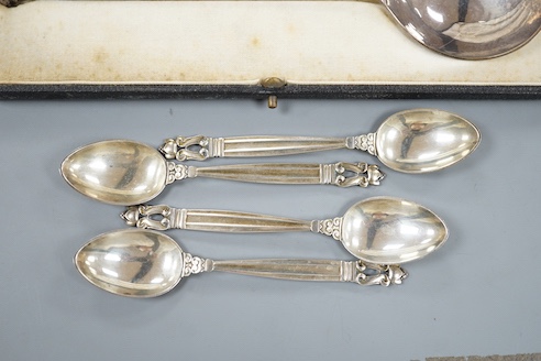 Four Georg Jensen sterling teaspoons, with Jensen box and a cased pair of continental white metal spoons, with cabochon terminals, gross 183 grams.